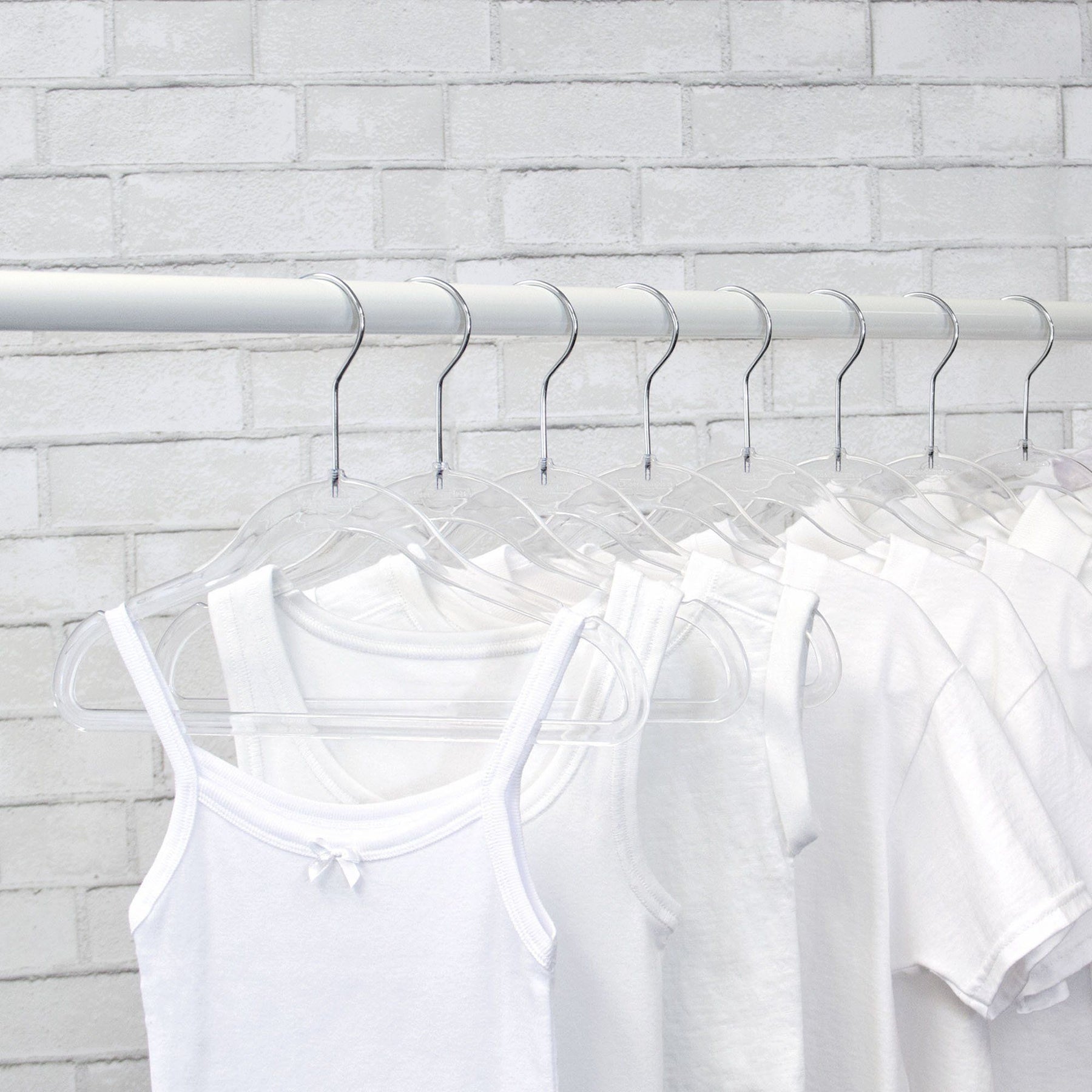 https://www.closetcomplete.com/cdn/shop/products/closet-complete-acrylic-hangers-kids-baby-sized-completely-clear-acrylic-hangers-69190-7162547372117_1800x1800.jpg?v=1552520336